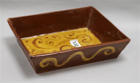 A 19ct century slipware baking dish, 25.8cm.